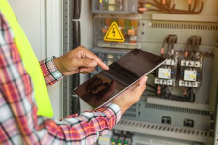 Electrician using tablet