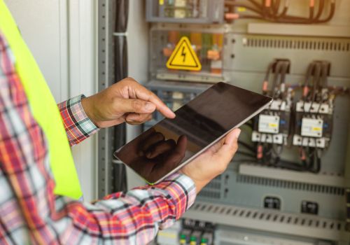 Electrician using tablet