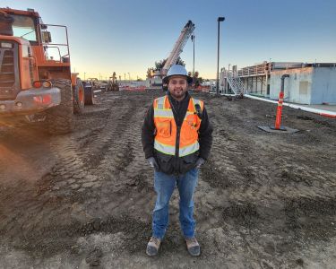 Joel standing on jobsite